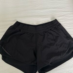 Used Lululemon black hotty hot shorts size 8